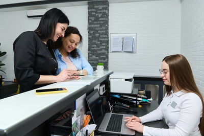 Business colleagues working in office