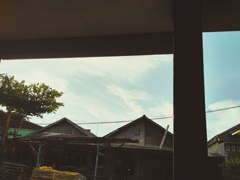 Low angle view of houses against sky