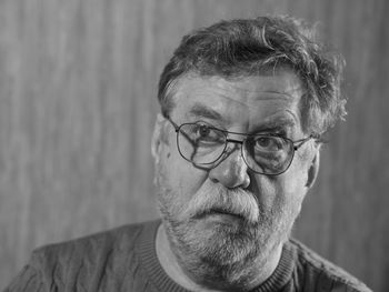 Portrait of man wearing eyeglasses