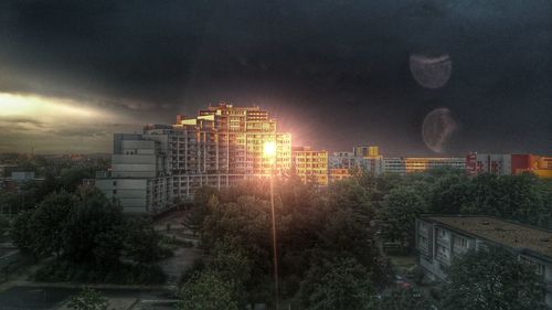 Illuminated buildings in city at night