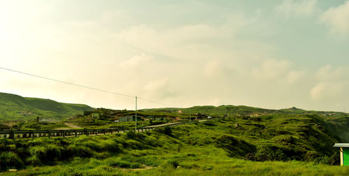 Scenic view of land against sky