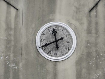 Close-up of clock on wall