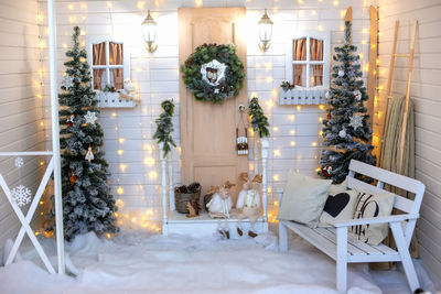 Christmas interior for a photo shoot in white colors.