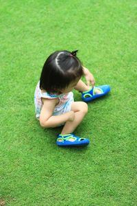 Girl playing with toy in park