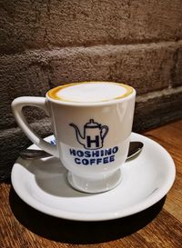 Close-up of coffee cup on table