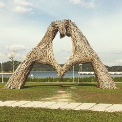 Gazebo in park against sky