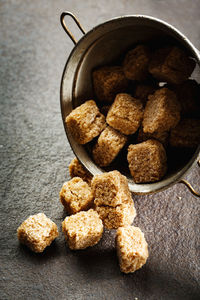 High angle view of cookies in container on table