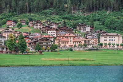 View of houses with trees in background