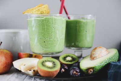 Close-up of kiwi juices in glass