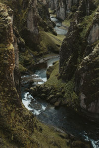 Scenic view of stream flowing through rocks