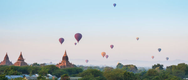 View of hot air balloons against sky