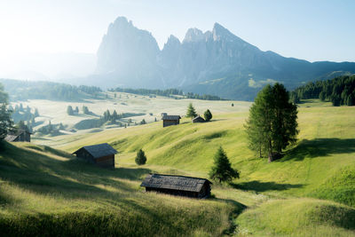 Scenic view of landscape and mountains against sky