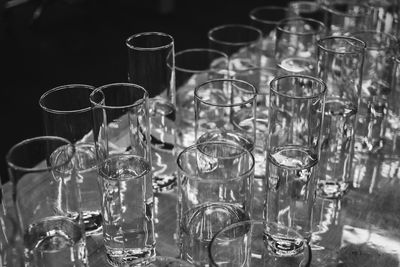 Close-up of wine glasses on table