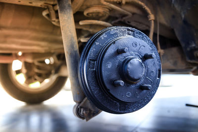 A rear hub of the car after removing a tire and wheel, maintaining a brake and wheel system