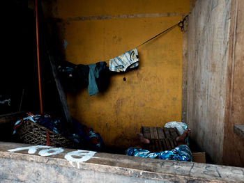 Clothesline hanging against wall