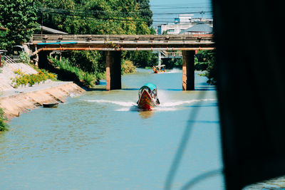 Rear view of man on bridge