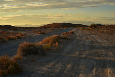 Scenic view of landscape against sky during sunset