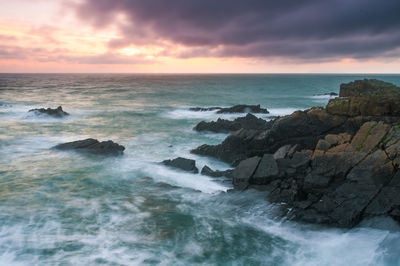 Scenic view of sea against sky during sunset