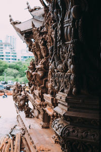 Close-up of statue against building