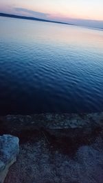 Scenic view of sea against sky at sunset