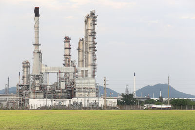 View of factory against sky