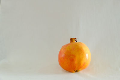 Close-up of apple against white background
