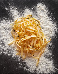 High angle view of noodles on barbecue grill