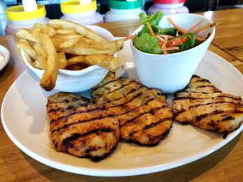 Close-up of food served on table