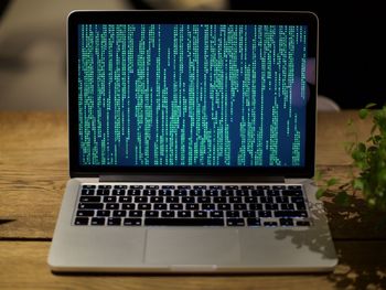 Hacked laptop on table