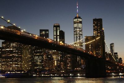 Illuminated buildings at waterfront