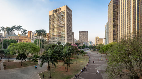 Buildings in city against sky