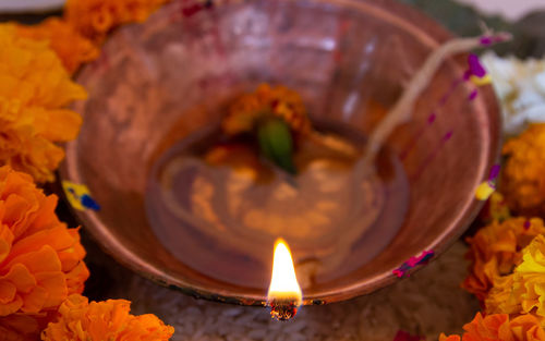 Close-up of lit tea light candles