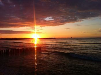 Scenic view of sea against sky during sunset