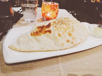 Close-up of bread in plate on table