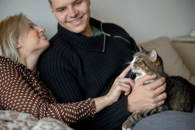 Young woman with cat