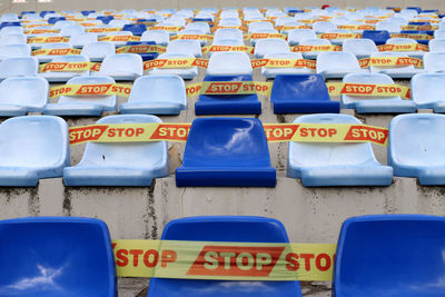 Full frame shot of blue seats in row