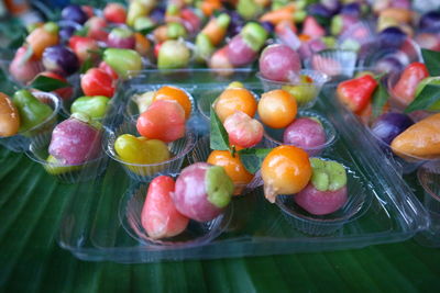 High angle view of fruits in container