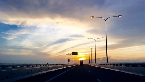 Road against sky during sunset