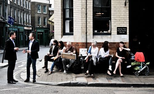 People walking on city street