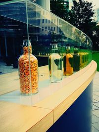 Close-up of food on table against building