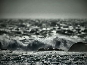 Waves splashing on rocks