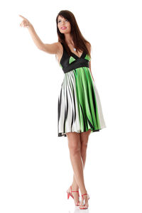 Low section of woman standing against white background