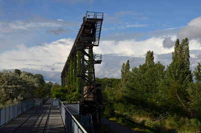 Steel construction against sky in duisburg landschaftspark nord