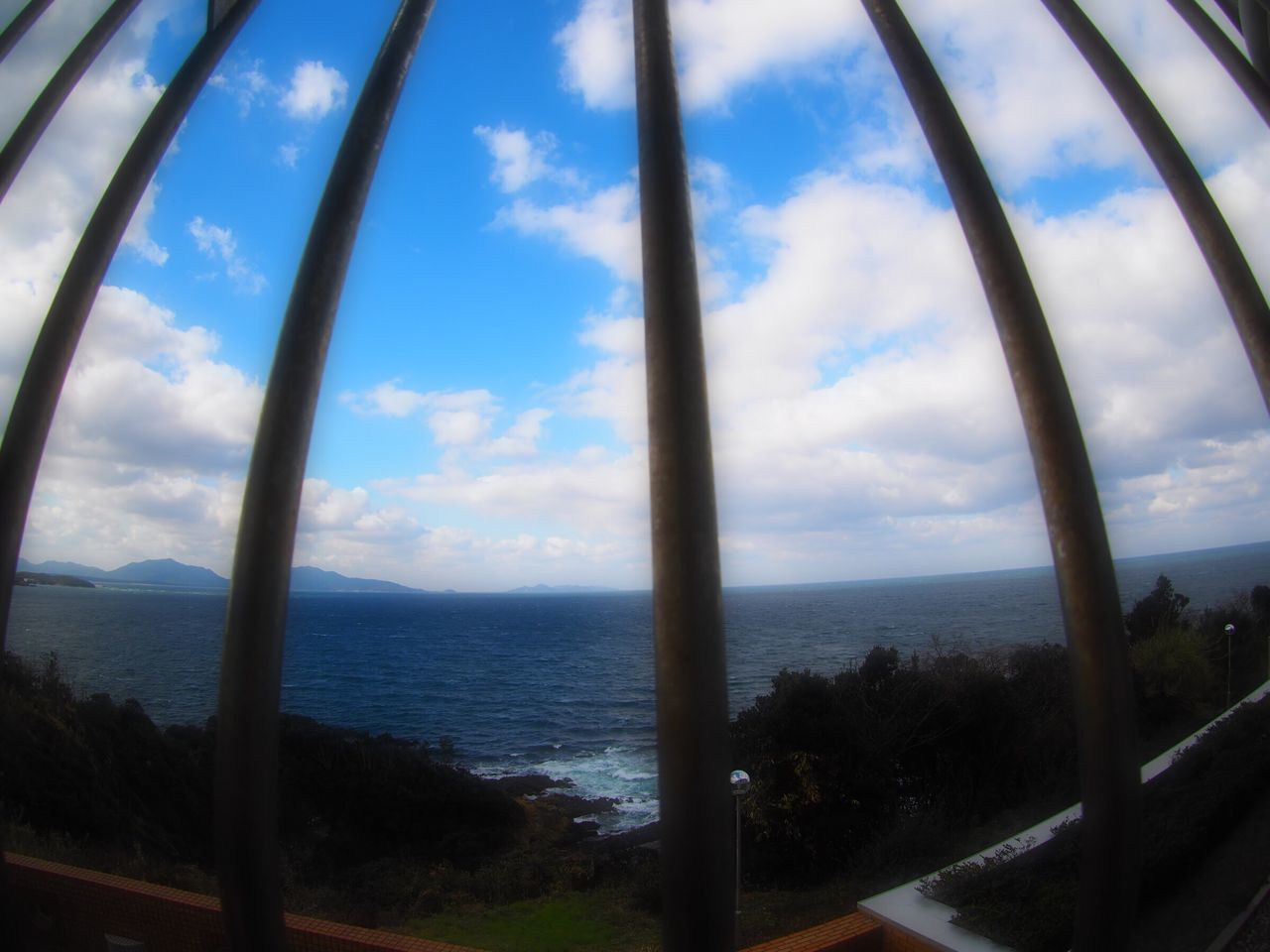 sky, sea, horizon over water, water, cloud - sky, scenics, indoors, tranquility, beauty in nature, window, nature, tranquil scene, cloud, day, tree, idyllic, sunlight, railing, no people, cloudy