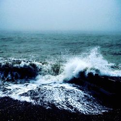 Waves splashing on rocks