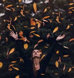 Woman swimming in fish tank