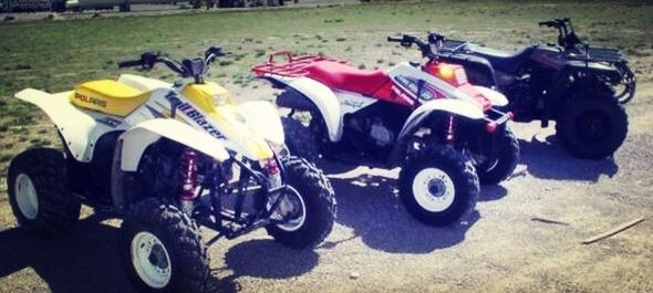 transportation, land vehicle, mode of transport, field, car, stationary, grass, day, outdoors, motorcycle, street, sunlight, parking, high angle view, no people, variation, toy, parked, tractor, wheel