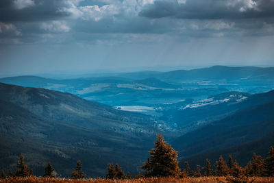 Scenic view of mountains against sky during winter