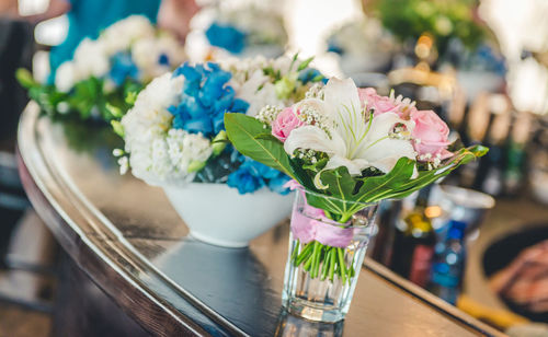 Close-up of posies arranged on table