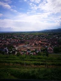 Aerial view of townscape against sky